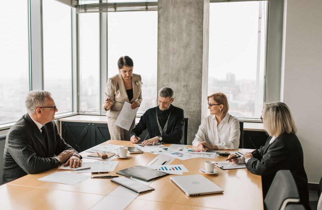 Executive leadership team discussing contract hiring strategy in 2026