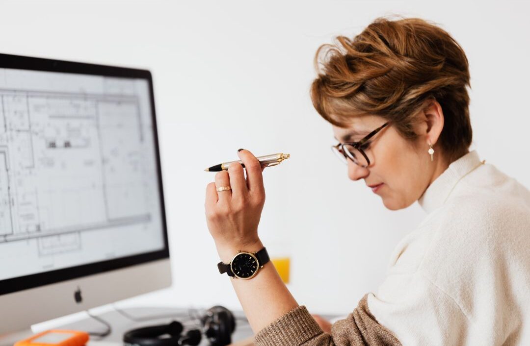 Candidate researching a company online before applying, reviewing employer brand content.