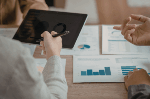 Executive reviewing hiring performance metrics beyond time-to-fill in 2026