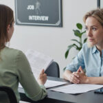 Professional relationship building between recruiter and candidate in a business setting